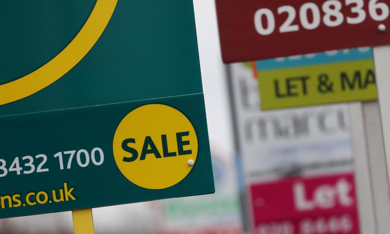 <span>Estate agent boards in London on 31 January 2024. </span><span>Photograph: Neil Hall/EPA</span>