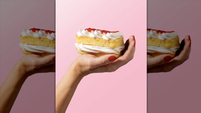 Crumbl strawberry shortcake in hand