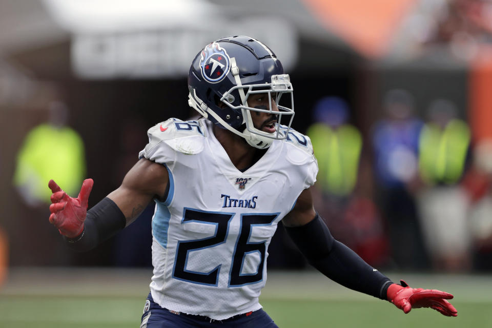 FILE - In this Sept. 8, 2019, file photo, Tennessee Titans cornerback Logan Ryan (26) keeps watch during the second half in an NFL football game against the Cleveland Browns in Cleveland. The 29-year-old Ryan played his first four NFL seasons with New England, helping the Patriots win two Super Bowls before signing a three-year, $30 million contract that included $12 million guaranteed with Tennessee in 2017. He set career highs with 105 total tackles, 18 passes defensed and 4½ sacks to go along with four interceptions last season, but Tennessee chose to move on. (AP Photo/Ron Schwane, File)