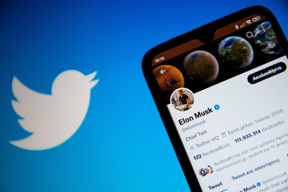 In this photo illustration Elon Musk Twitter seen displayed on a smartphone screen with Twitter logo in the background in Athens, Greece on October 30, 2022. Elon Musk begins his Twitter ownership with firings. (Photo by Nikolas Kokovlis/NurPhoto via Getty Images)