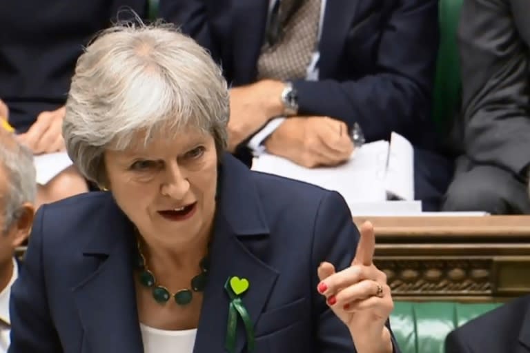 Britain's Prime Minister Theresa May says parliament cannot tie the hands of government in Brexit negotiations