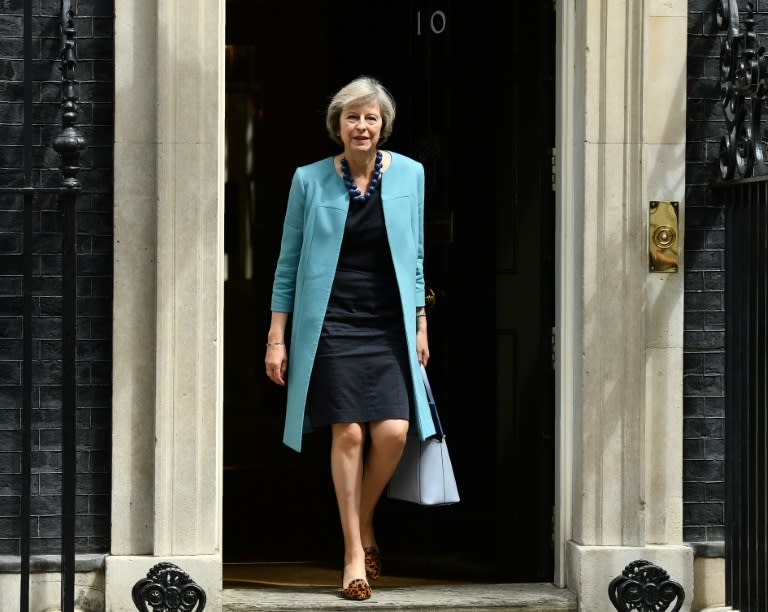 British Home Secretary Theresa May walks through the door of 10 Downing Street in central London on June 27, 2016