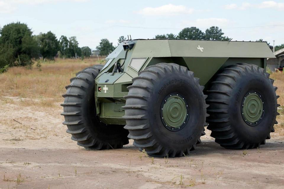 A squat Ukrainian drone with four large wheels.