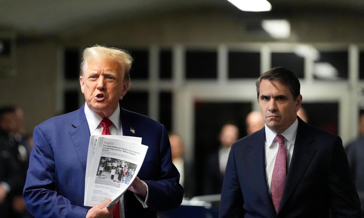 <span>Trump complains to reporters after court in New York on Monday.</span><span>Photograph: Julia Nikhinson/UPI/REX/Shutterstock</span>