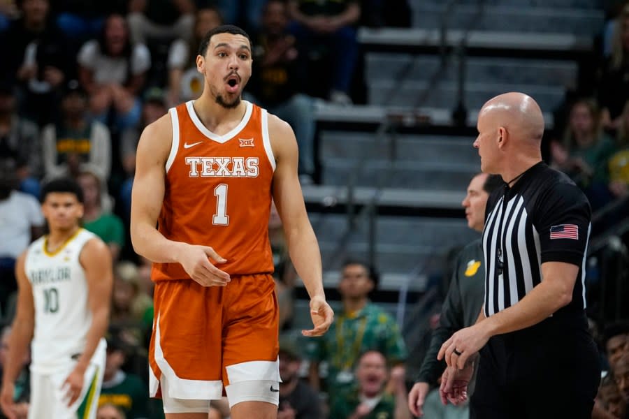 Texas’s Dylan Disu (1) reacts after being called for a technical foul after scoring a three-point basket against Baylor during the first half of an NCAA college basketball game, Monday, March 4, 2024, in Waco, Texas. (AP Photo/Julio Cortez)