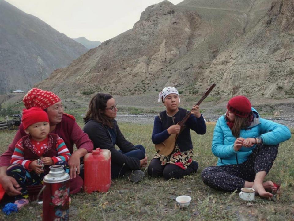 Camping in Kyrgyzstan, the couple were visited by a nearby family who brought sweet tea, bread... and, ‘before leaving for the night, a really special and beautiful musical performance from their eldest daughter’ (Simply Cycling)