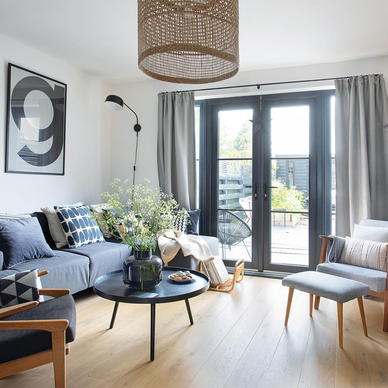  Black and white living room with sofa. 