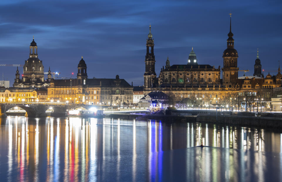 In the morning view of the historic old town scenery at the Elbe with the Frauenkirche,the Staendehaus, the Hofkirche, the town hall, the Hausmannsturm, the Kreuzkirche and the Residenzschloss are seen on Thursday, Feb.13, 2020. On the 75th anniversary of the destruction of Dresden in the Second World War, the city commemorates with numerous events. On 13 and 14 February 1945, Allied bombers reduced the centre of the Elbe city to rubble and ashes. Up to 25,000 people lost their lives. (Robert Michael/dpa via AP)
