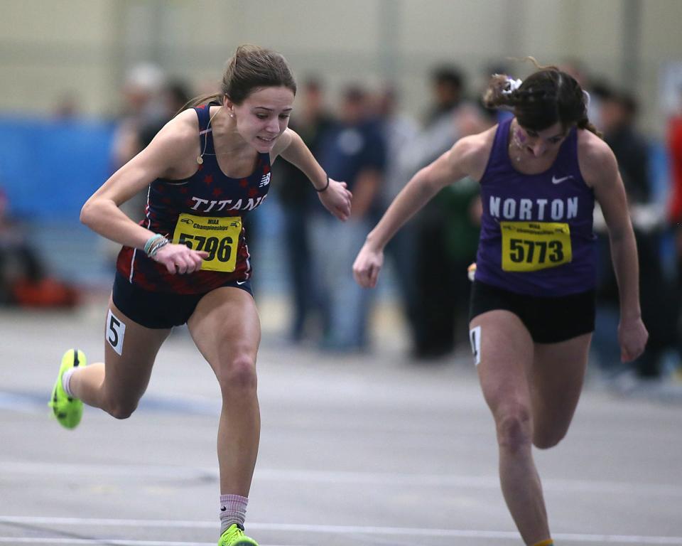 Pembroke’s Sarah Claflin surges forward to take first place in the 55 meter dash with a time of 7.12 edging second place by 0.001 at the MIAA Meet of Champions at the Reggie Lewis Track Center in Boston on Saturday, Feb. 25, 2023.