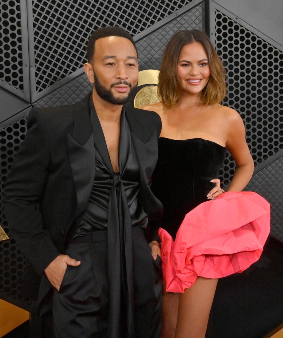 John Legend and Chrissy Teigen Attend the 66th Grammy Awards in Los Angeles