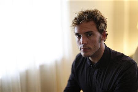 British actor Sam Claflin poses for a portrait while promoting his upcoming movie "The Quiet Ones" at Chateau Marmont in West Hollywood, California April 22, 2014. REUTERS/Mario Anzuoni