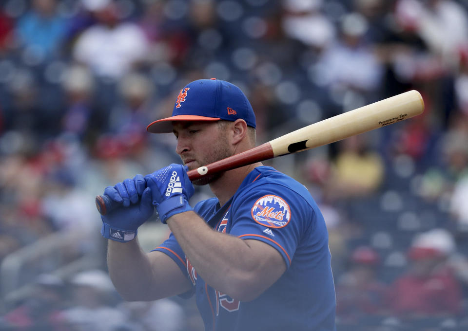 New York Mets's Tim Tebow (15) practices batting before an exhibition spring training baseball game against the Washington Nationals on Thursday, March 7, 2019, in West Palm Beach, Fla. (AP Photo/Brynn Anderson)