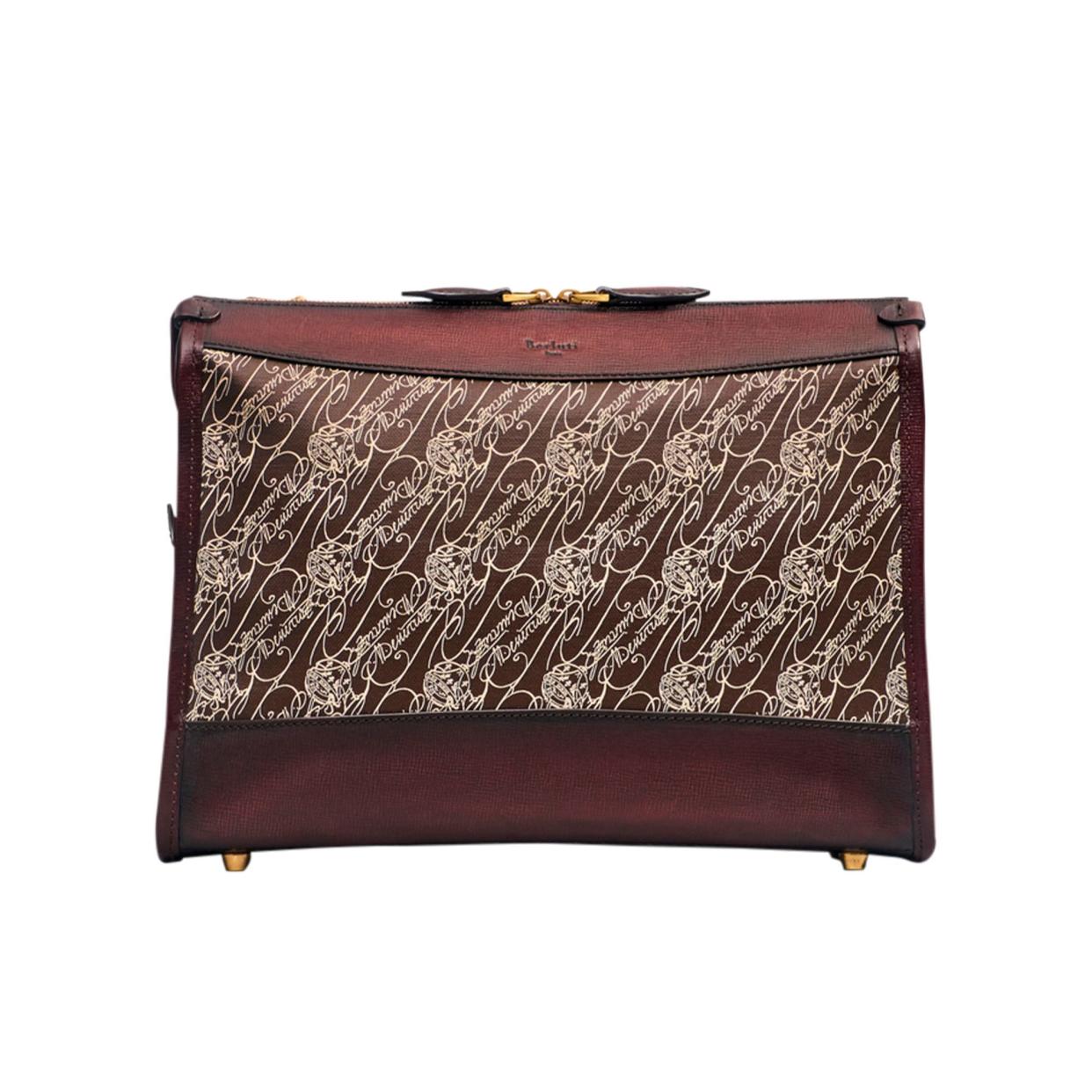 <p><a href="https://www.berluti.com/en-us/musette-toile-marbeuf-messenger/MUSETTE-T19.html" rel="nofollow noopener" target="_blank" data-ylk="slk:Shop Now;elm:context_link;itc:0;sec:content-canvas" class="link rapid-noclick-resp">Shop Now</a></p><p>Musette Toile Marbeuf Messenger Bag</p><p>$1970.00</p>