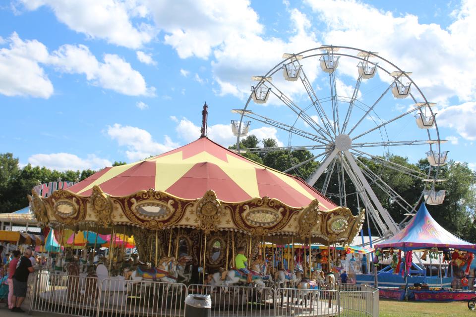 The carousel and Ferris wheel are among the attractions at the Allegany County Fair in Angelica.
