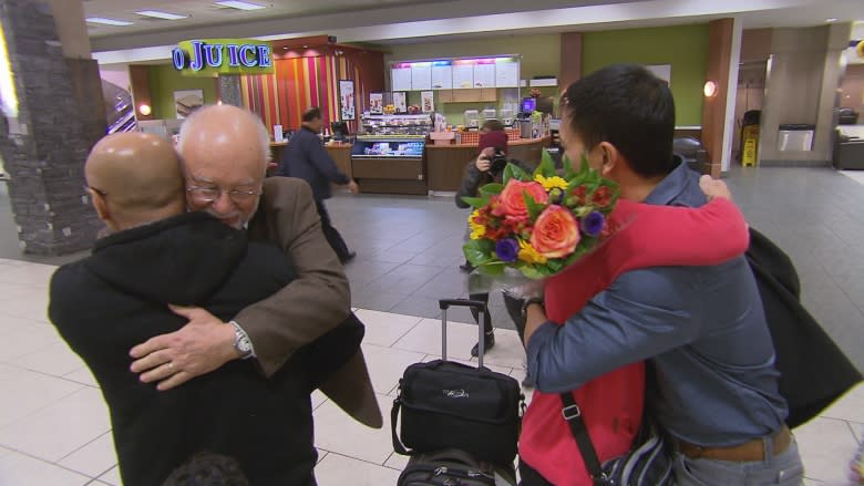 He smuggled two young boys out of Laos in 1977, now they've reunited