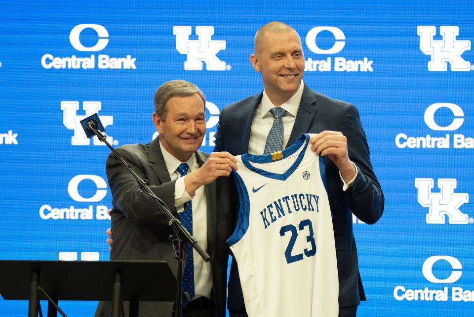 Coach Mark Pope, right, and the Kentucky Wildcats would be key to a college basketball showcase event in Cincinnati, writes Enquirer columnist Jason Williams.