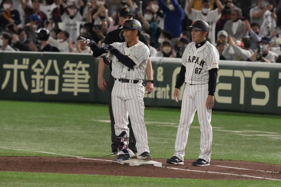 吉田正尚。(AP Photo/Eugene Hoshiko)