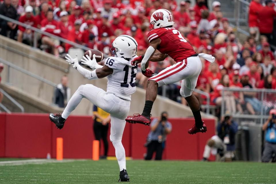 Penn State's Ji'Ayir Brown breaks up a pass intended for ]Wisconsin's Kendric Pryor during the second half of an NCAA college football game Saturday, Sept. 4, 2021, in Madison, Wis. Penn State won 16-10. (AP Photo/Morry Gash)
