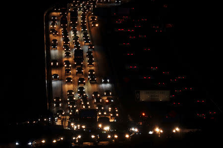 FILE PHOTO: Traffic travels along interstate 5 past Solana Beach, California, U.S., March 20, 2019. REUTERS/Mike Blake/File Photo