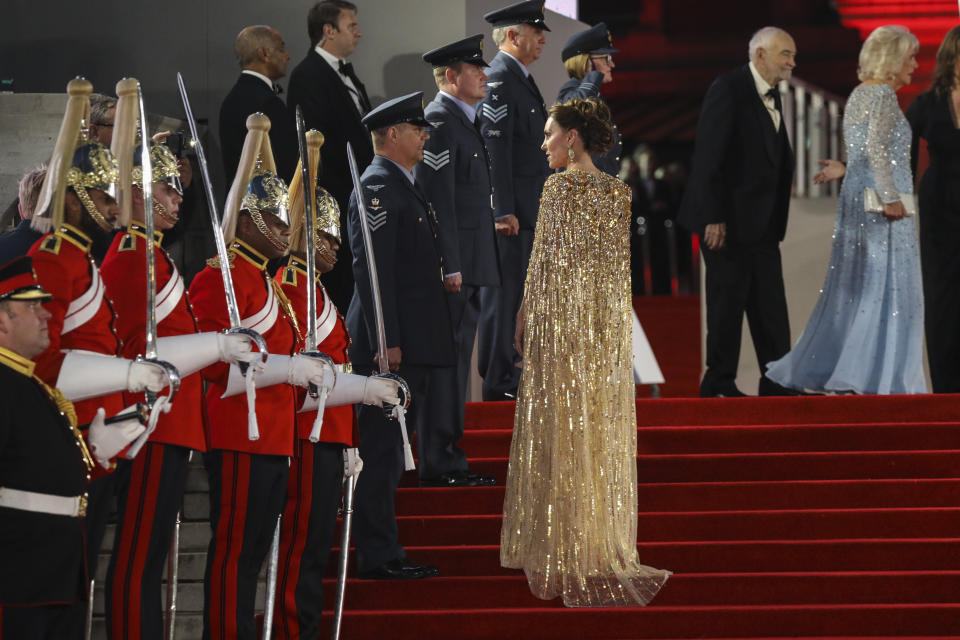 Kate the Duchess of Cambridge speaks with a member of the military upon arrival for the World premiere of the new film from the James Bond franchise 'No Time To Die', in London Tuesday, Sept. 28, 2021. (Photo by Vianney Le Caer/Invision/AP)