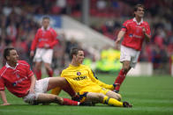 <p>Terry was sent out on loan to Nottingham Forest in 2000 to gain first-team experience. He played six games for Forest and is pictured after tackling future team-mate Scott Parker (Getty Images) </p>