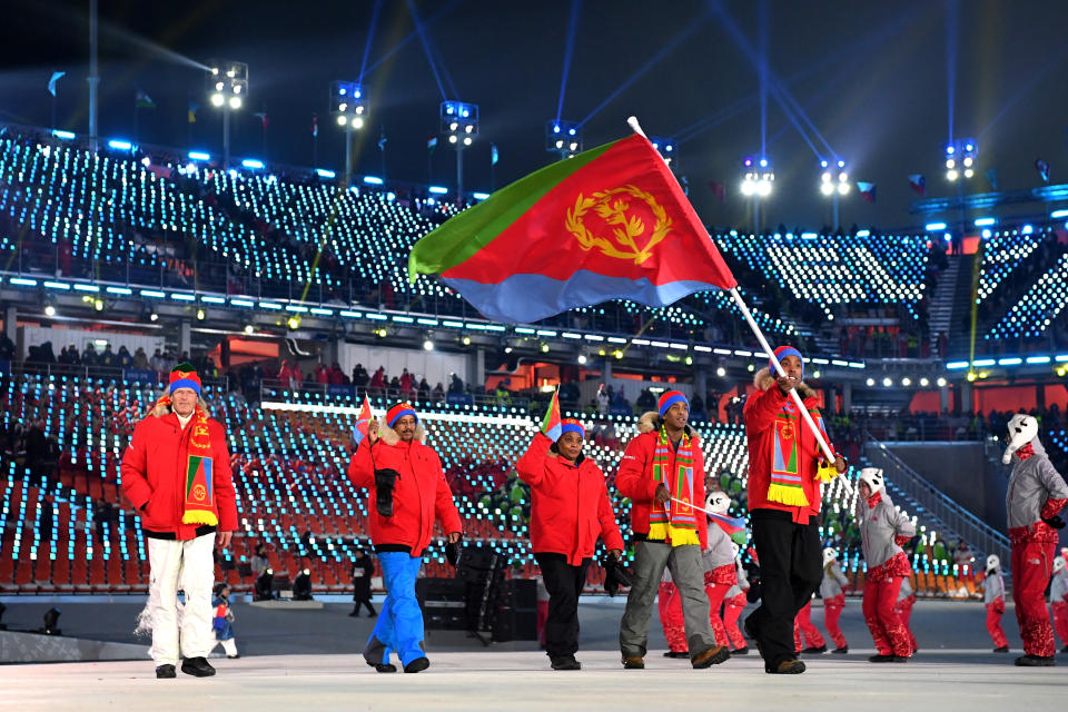 <p>Flag bearer Shannon-Ogbani Abeda of Eritrea and teammates arrive at the stadium during the Opening Ceremony of the PyeongChang 2018 Winter Olympic Games at PyeongChang Olympic Stadium on February 9, 2018 in Pyeongchang-gun, South Korea. (Photo by Matthias Hangst/Getty Images) </p>