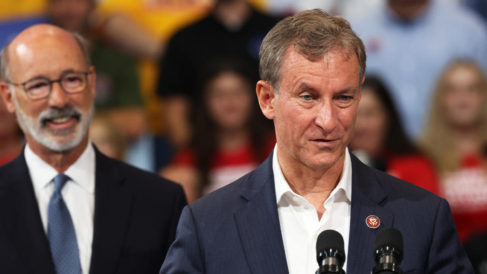 Matt Cartwright, Pa. Democrat, speaking as former Gov. Tom Wolfe, D-Pa., left, looks on at