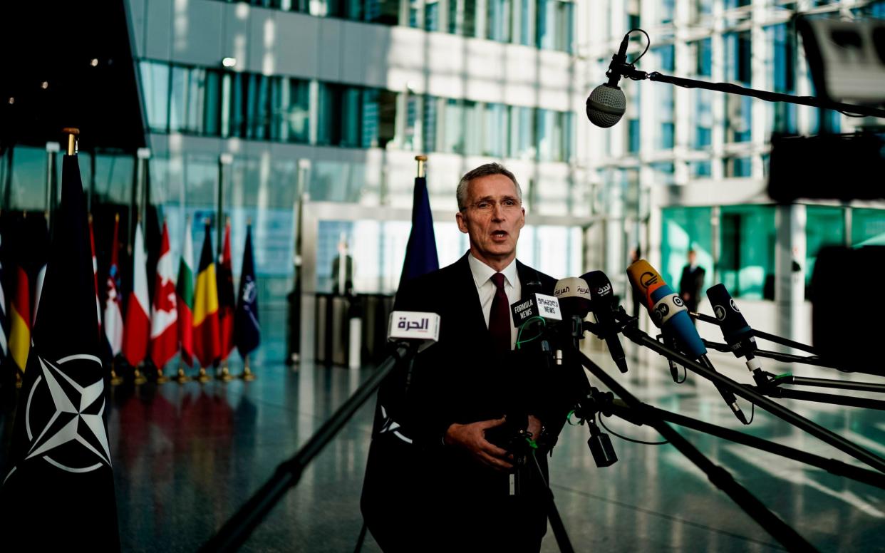 Nato Secretary General Jens Stoltenberg answers journalists' questions as he arrives for a Nato Foreign Affairs ministers' summit at the alliance's headquarters in Brussels. Nov 20, 2019.  - AFP