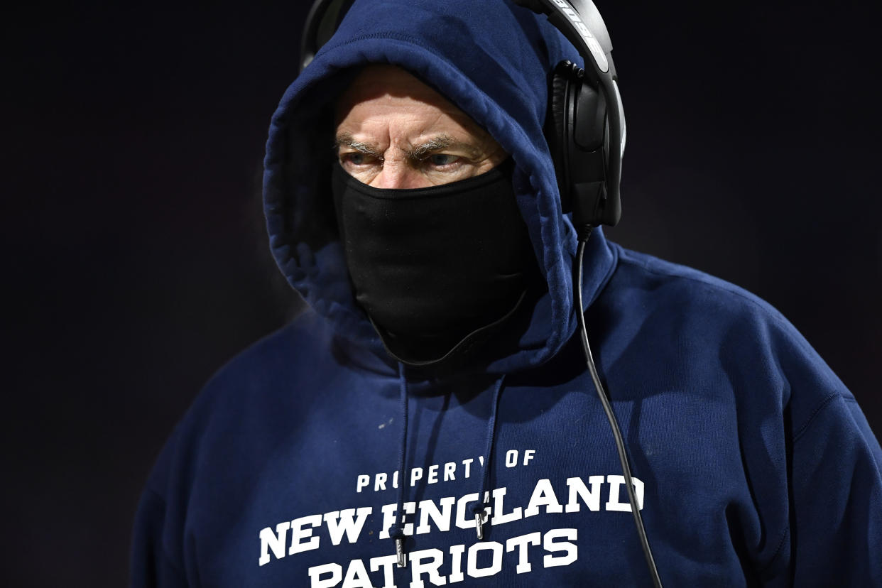 New England Patriots head coach Bill Belichick works the sidelines during the first half of an NFL wild-card playoff football game against the Buffalo Bills, Saturday, Jan. 15, 2022, in Orchard Park, N.Y. (AP Photo/Adrian Kraus)