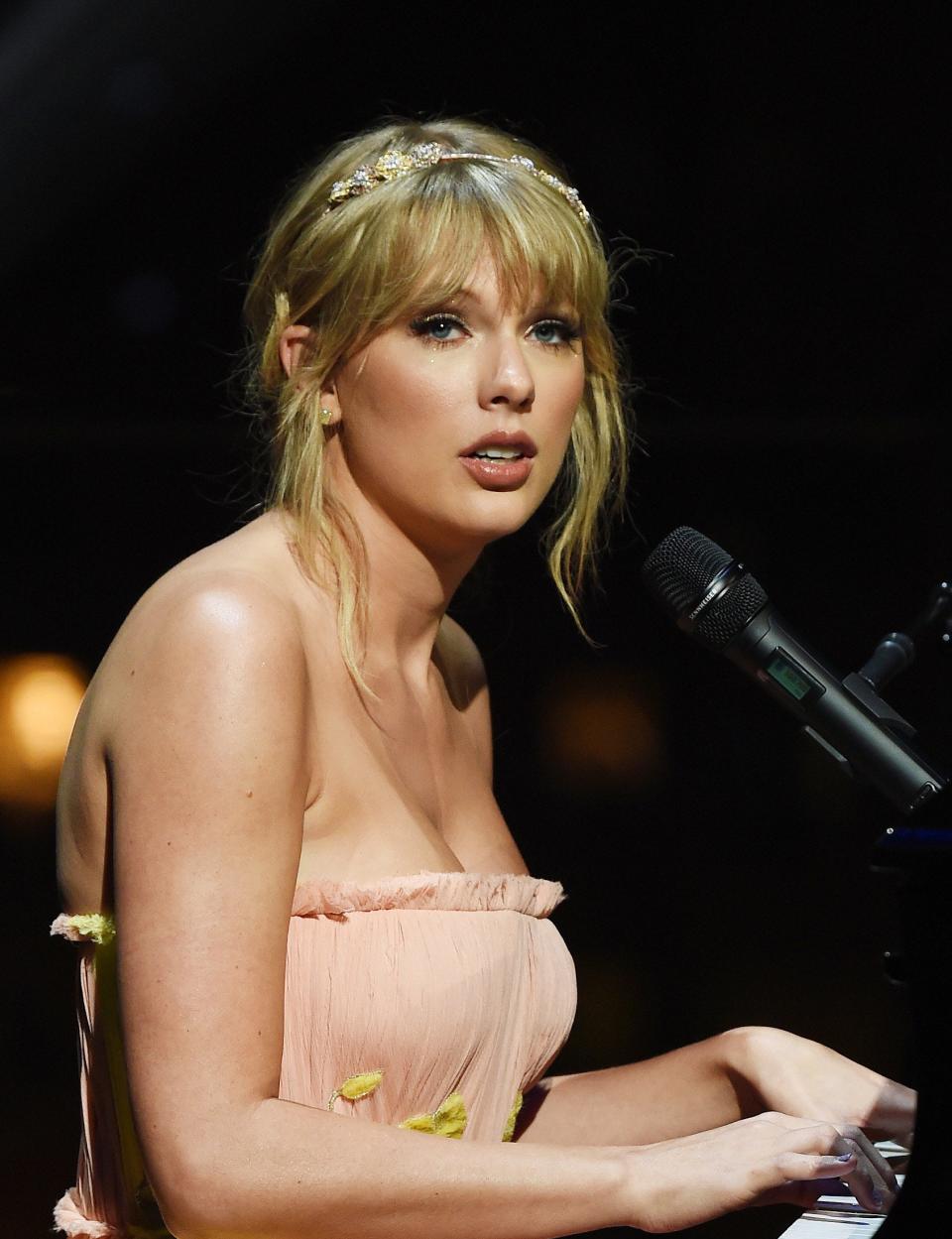 Close-up of Taylor at a piano