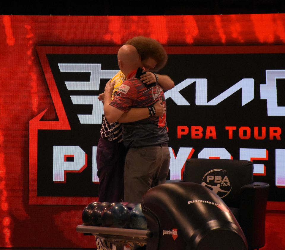 PBA bowlers Kyle Troup (;eft) and Tommy Jones embrace following the former's victory in the PBA Playoff finals on Sunday at Bowlero Jupiter. Troup defeated his opponent in four games to defend his title on May 15, 2022.