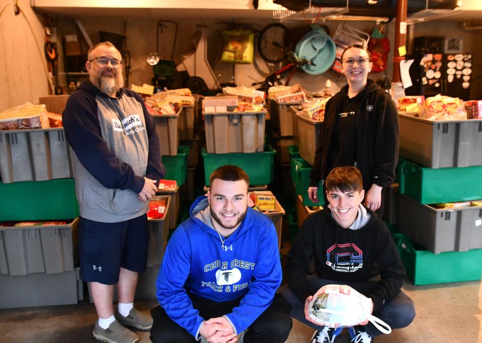 Volunteers from Greektown Pizza received enough donations from the Lebanon community during the fourth annual food drive to feed 100 families in need. "We all came together, and this is what a community can do." Greektown co-owner Thomas Kline said.