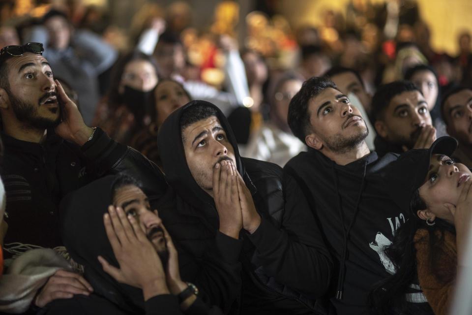 FILE - Moroccans react while following the penalty shootouts between Morocco and Spain in a World Cup soccer match played in Qatar, in Rabat, Morocco, Tuesday, Dec. 6, 2022. (AP Photo/Mosa'ab Elshamy, File)