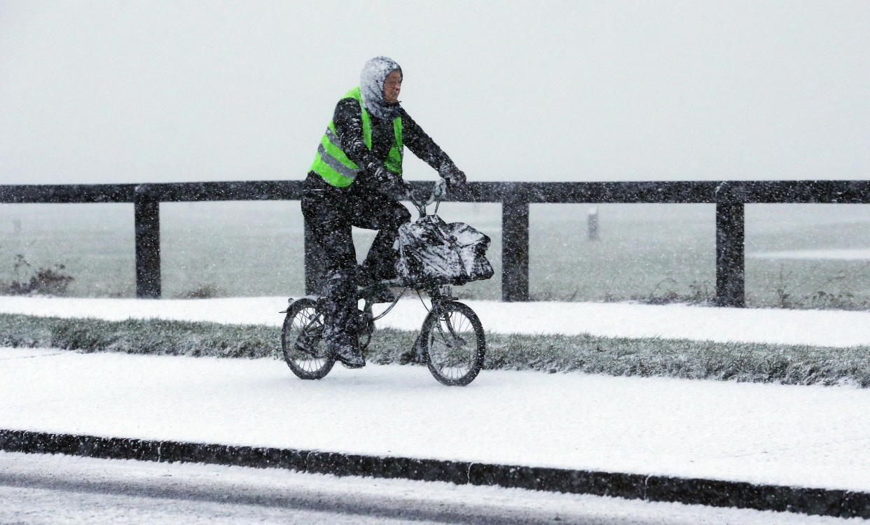 The snow didn’t stop this cyclist from going for a ride in Whitley Bay, North Tyneside yesterday (PA)