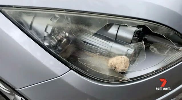 A victim's front windscreen was smashed by a rock thrown from an overpass. Source: 7 News