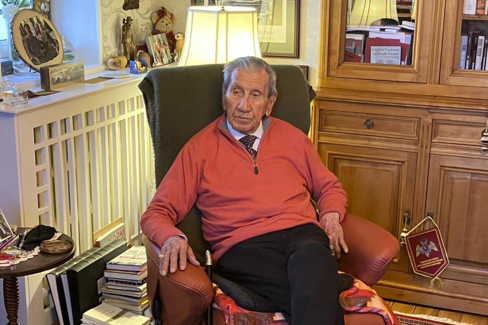 WWII veteran Charles Shay, is pictured at his home Sunday, March 24, 2024 in Bretteville-l'Orgueilleuse, Normandy. On D-Day, Charles Shay was a 19-year-old Native American army medic who was ready to give his life — and actually saved many. Now 99, he's spreading a message of peace with tireless dedication as he's about to take part in the 80th celebrations of the landings in Normandy that led to the liberation of France and Europe from Nazi Germany occupation. (AP Photo/Jeffrey Schaeffer)