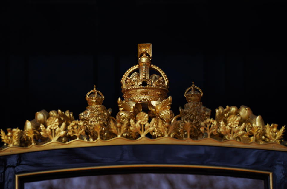 The crown on top of the Diamond Jubilee State Coach can hold a camera 