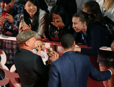 Actor Woody Harrelson interacts with fans as he arrives for the premiere of the film "LBJ" at TIFF the Toronto International Film Festival in Toronto, Canada September 15, 2016. REUTERS/Fred Thornhill