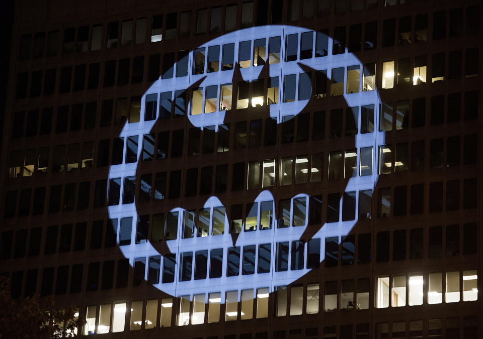 The Batman signal is projected onto a building to celebrate Batman Day in Montreal, Saturday, Sept. 21, 2019. The night sky all over the world is lighting up Saturday with an illumination of the famed bat insignia to mark a special anniversary for Batman. DC Comics is carrying off a celebration of Batman Day to mark the 80th anniversary of the appearance of crimefighter Bruce Wayne and his masked hidden identity. (Graham Hughes/The Canadian Press via AP)