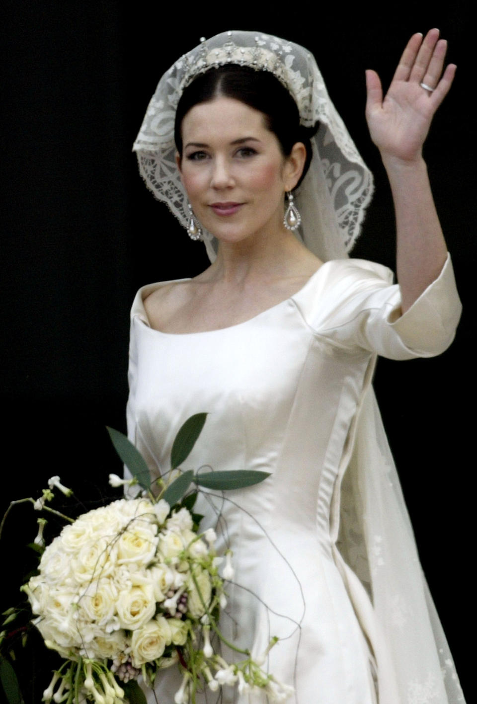 Crown Princess Mary arrives at Christian VII's Palace after her wedding to Crown Prince Frederik of Denmark May 14, 2004 in Copenhagen, Denmark. The romance began in 2000 when Mary Donaldson met the heir to one of Europe's oldest monarchies over drinks at the Sydney Olympics, where he was with the Danish sailing team. 