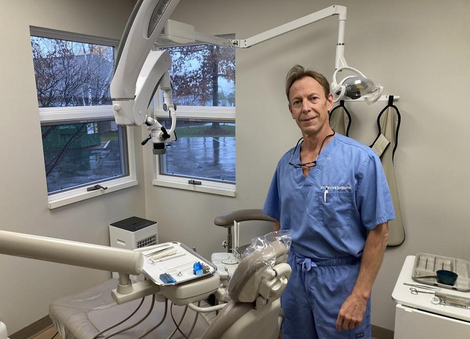 Erie endodontist Pat DeMarco stands in a treatment room at his Erie office on Nov. 14. DeMarco is the only dentist in the Erie area who specializes in root canals.