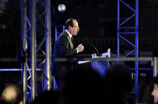 Socialist Party (PS) newly elected president Francois Hollande gives a speech after winning the second round of the presidential election in Tulle, southwestern France