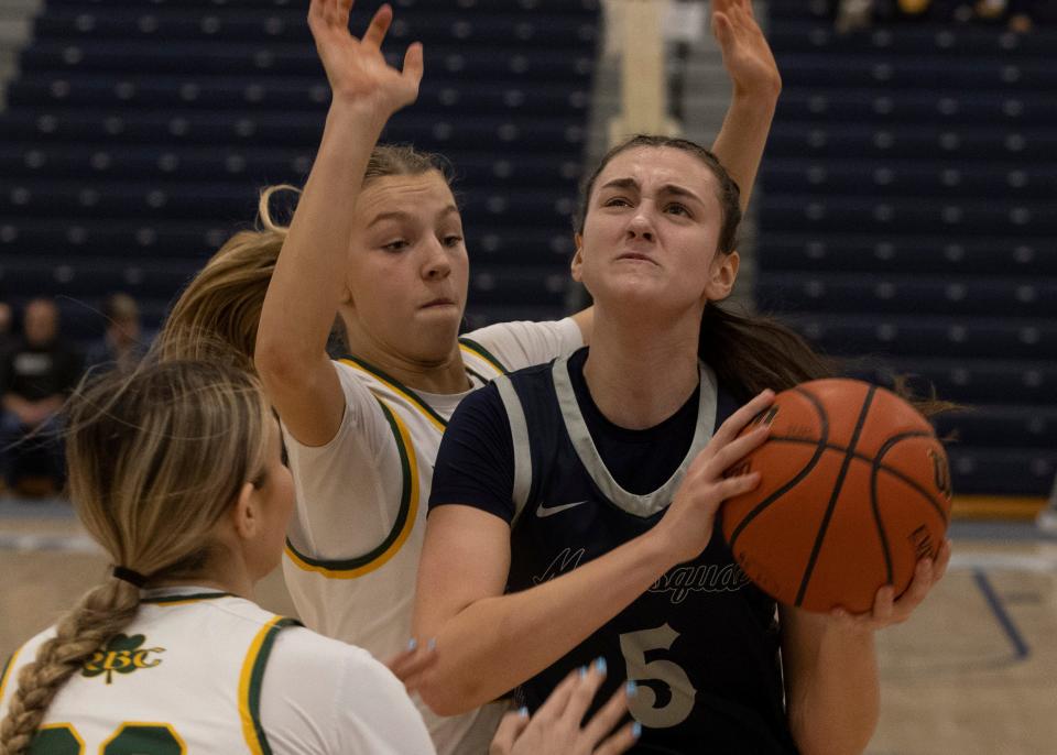 Manasquan's Katie Collins (with ball) in last season's Shore Conference Tournament semifinals.