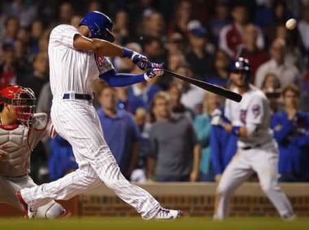 Jun 6, 2018; Chicago, IL, USA; Chicago Cubs right fielder Jason Heyward (22) hits a game-winning glad slam home against the Philadelphia Phillies in the ninth inning at Wrigley Field. Mandatory Credit: Jim Young-USA TODAY Sports