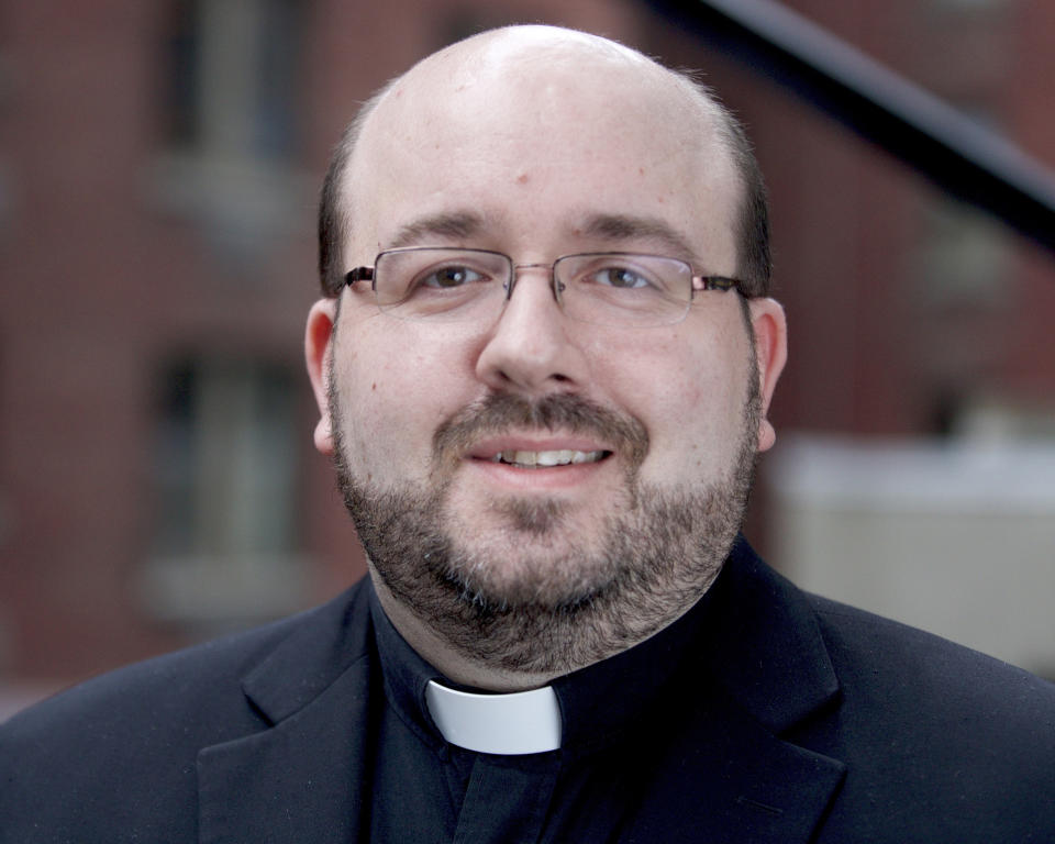 This undated photo provided by America Media in May 2022, shows Sam Sawyer, a Jesuit priest who is a senior editor of their magazine. He says he is a “dedicated pro-life advocate” who favors Roe’s reversal. Yet he responded to the Supreme Court leak with an essay listing reasons why abortion rights supporters are so alarmed by that prospect. “The pro-life movement and its political alliances are perceived as a threat not just to abortion itself but also to democratic norms, to judicial commitments to civil rights, and to women’s health and economic security,“ Sawyer wrote in the magazine. (Courtesy America Media via AP)