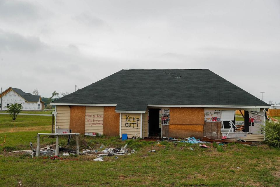 A home, yet to be demolished, shows the damage from a tornado that swept through the Park Place neighborhood of Ellabell in April of 2022.