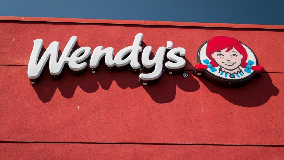 PHOTO: Signage is displayed outside a Wendys Co. restaurant in El Sobrante, Calif., May 6, 2020.   (David Paul Morris/Bloomberg via Getty Images, FILE)