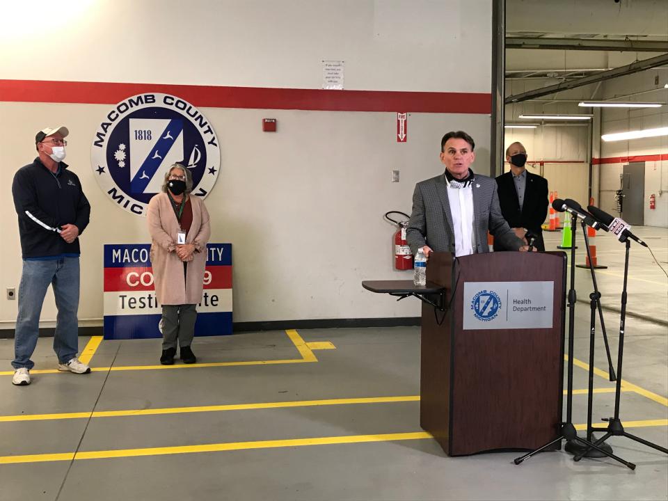Macomb County Executive Mark Hackel discusses COVID-19 vaccination sites and the new indoor drive-thru coronavirus test site at the former Baker College on Gratiot Avenue in Clinton Township on Dec. 11, 2020.
