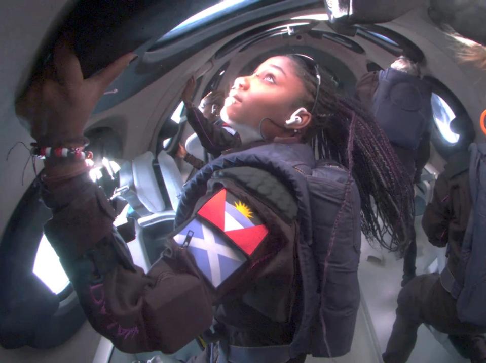 Anastatia Mayers and her mother Keisha Schahaff gaze back at Earth from the ISS Voyager (Virgin Galactic via AP)