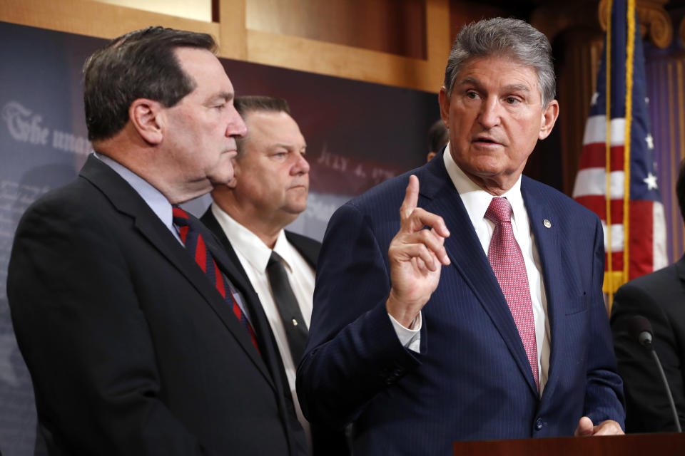 <span class="s1">Sen. Joe Donnelly, left, with Sen. Jon Tester, D-Mont., and Sen. Joe Manchin, D-W.Va., speaking about tax reform on Capitol Hill in November. (Photo: Jacquelyn Martin/AP)</span>